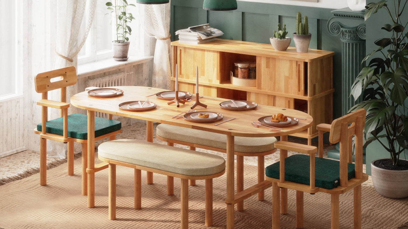 Solid beech dining table with bench, chairs and a sideboard in daylight
