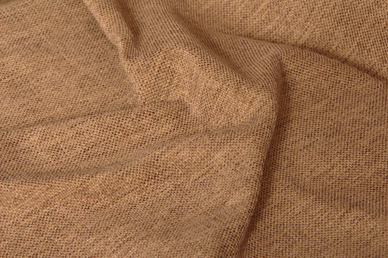 Linen upholstery swatch in brown