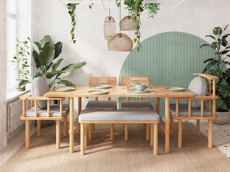 Devon and Throne chairs in gray linen around a Lugh dining table