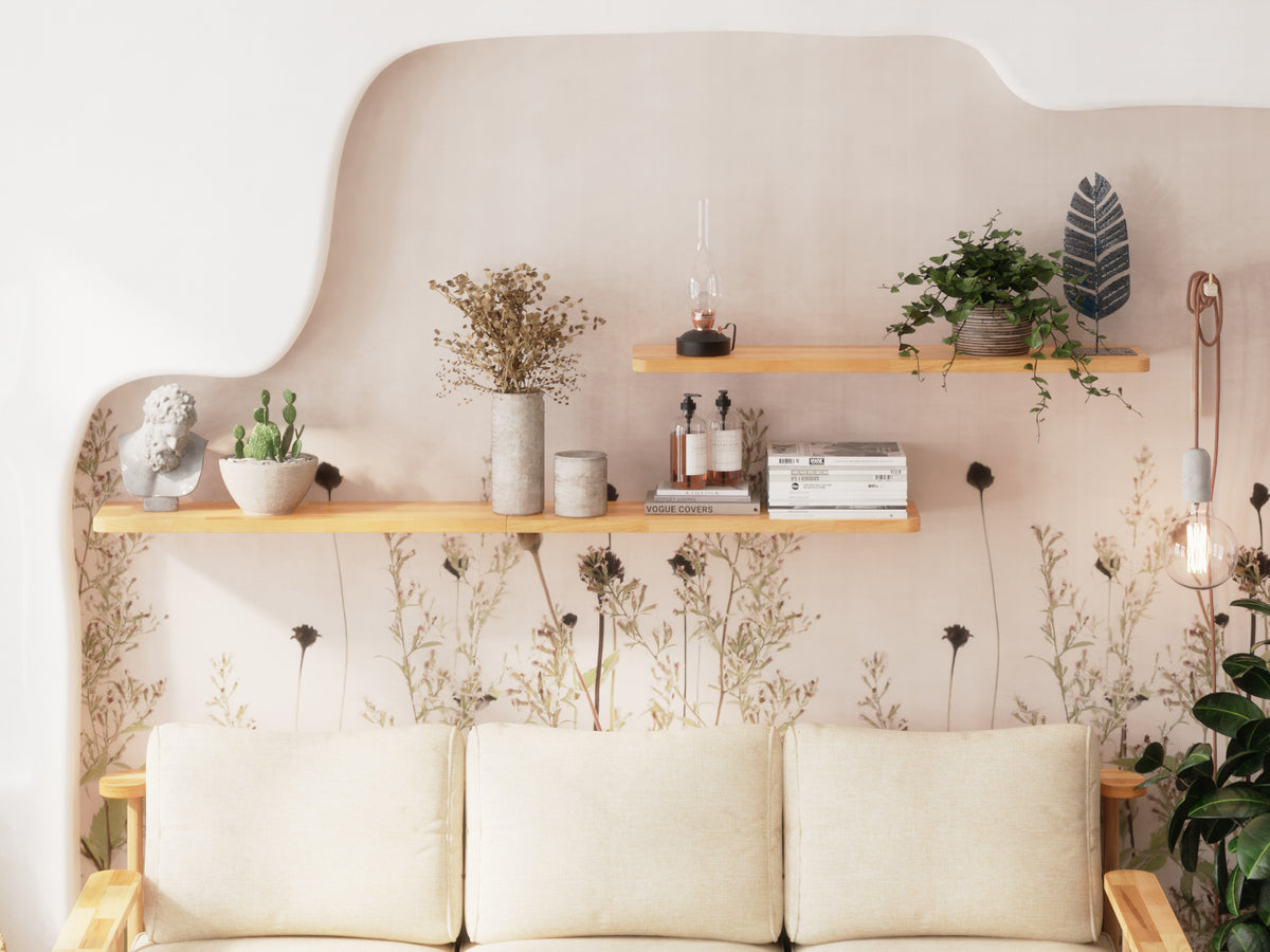 Lore three-seat sofa in ecru linen below a wall-mounted Sir shelf