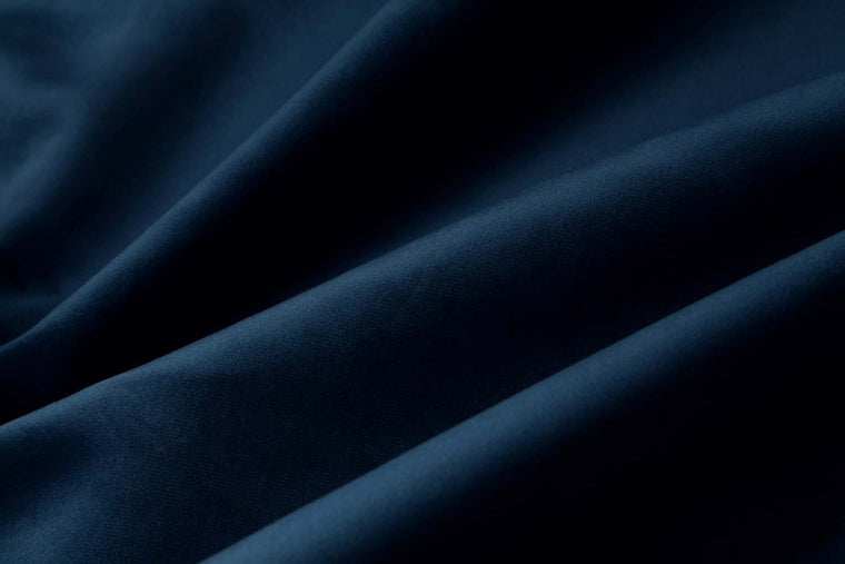 Velvet upholstery swatch in navy blue