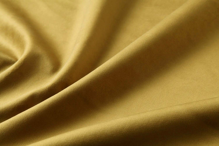 Velvet upholstery swatch in yellow