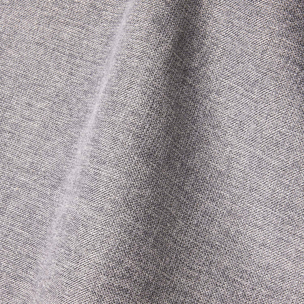 Close view of a grey woven upholstery fabric