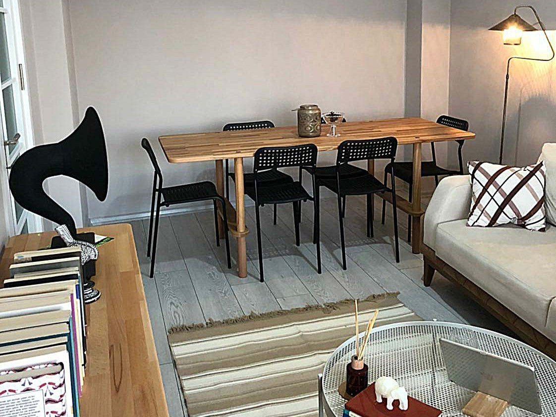 Dining table by Demontha, photographed in a finished room