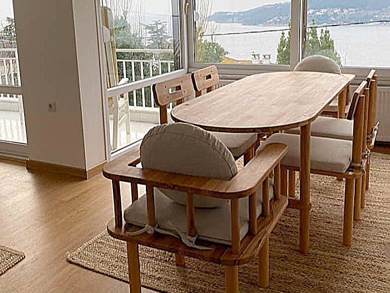 A solid beech dining table set for a meal
